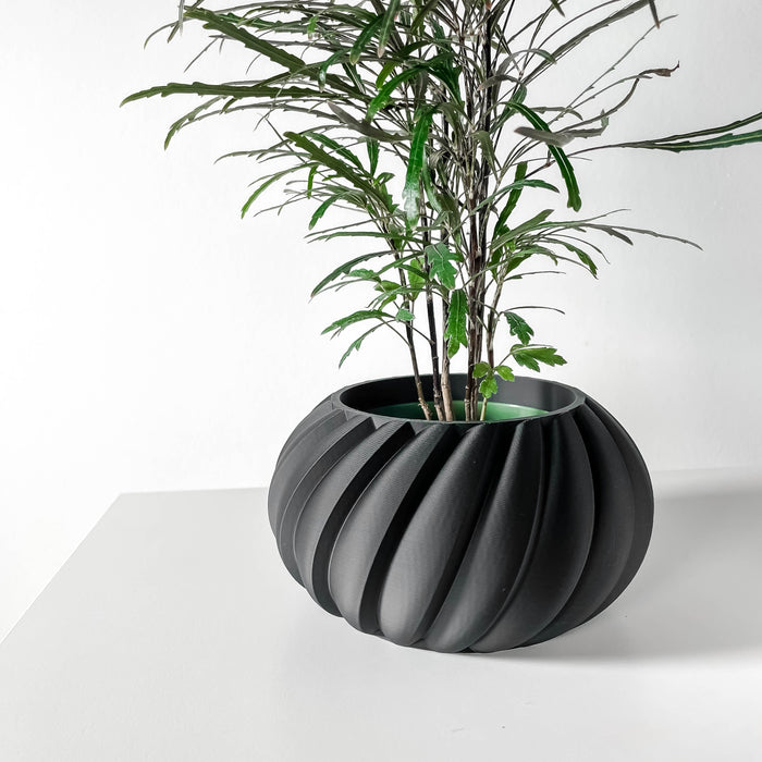 Black sculptural 3D printed planter with petal-inspired fluted texture, modern pot for minimal interiors and artistic spaces