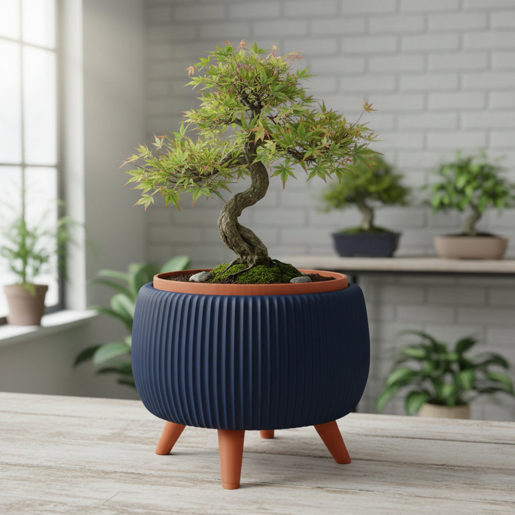 Arco raised two-color form with legs and a removable inner insert bonsai planter, side view
