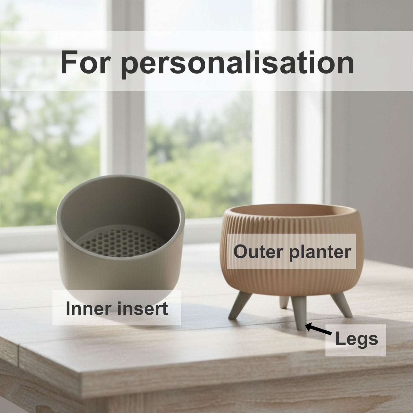 Arco raised two-color form with legs and a removable inner insert bonsai planter, indoor display view