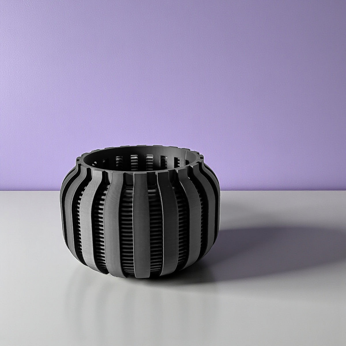 Avix ventilated orchid pot with rounded ribs, angled view of empty pot