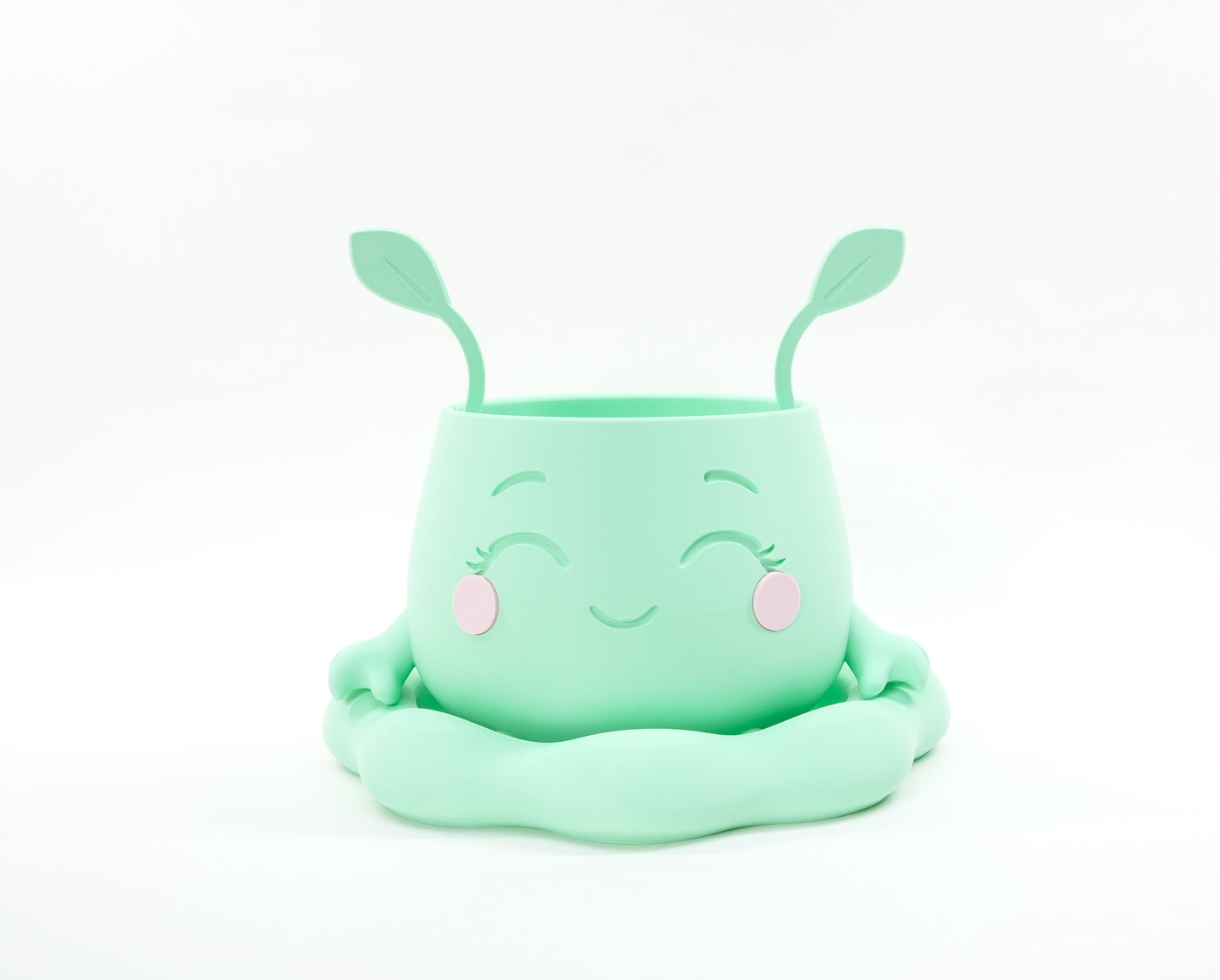 Pika a playful character form with removable leaf accents indoor planter, top opening view