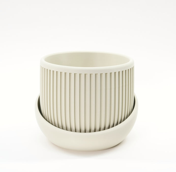 Beige wall mounted planter “Korin” with ribbed texture for indoor plant wall decor  
