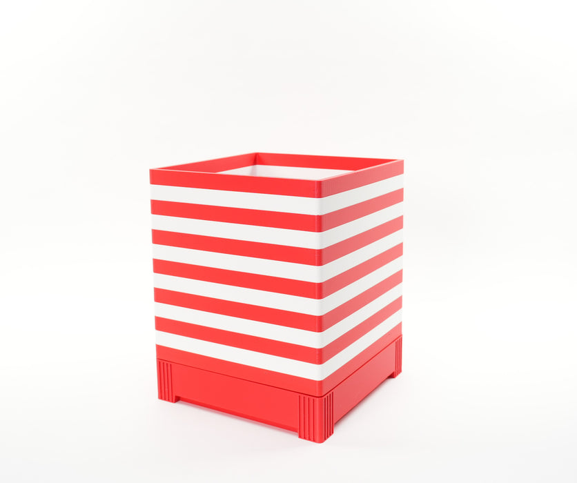 Rear angled view of American flag planter showing wraparound red and white stripes