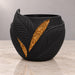 Empty Aurelia black planter showing the leaf relief, gold inlays and planting opening