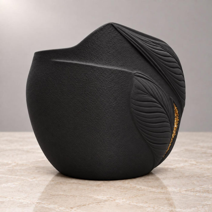 Aurelia black planter from the rear side showing fine texture and leaf relief