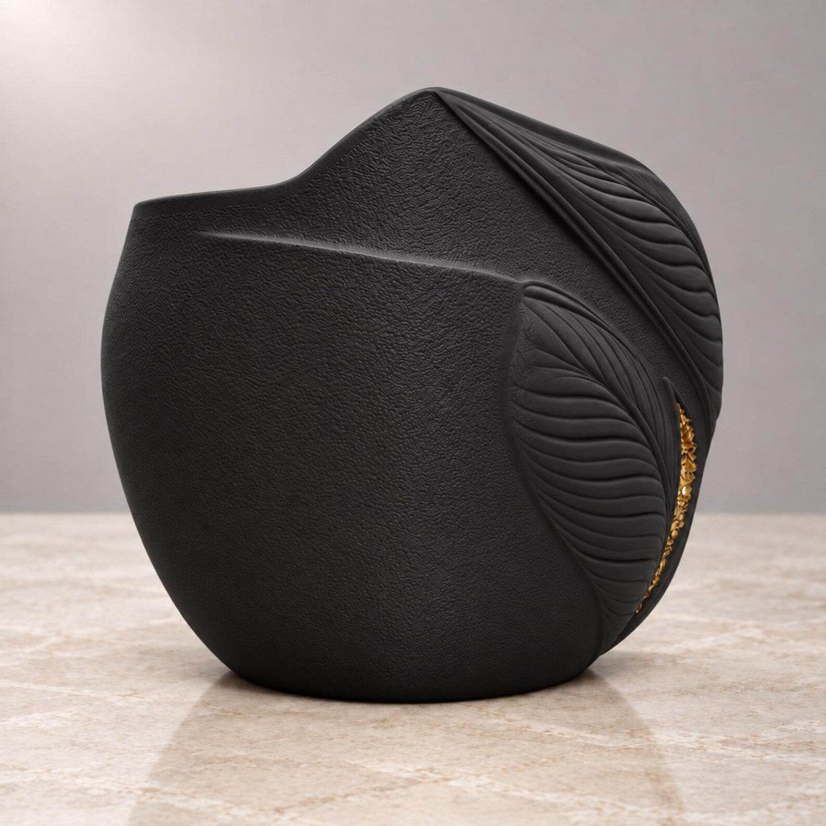 Aurelia black planter from the rear side showing fine texture and leaf relief