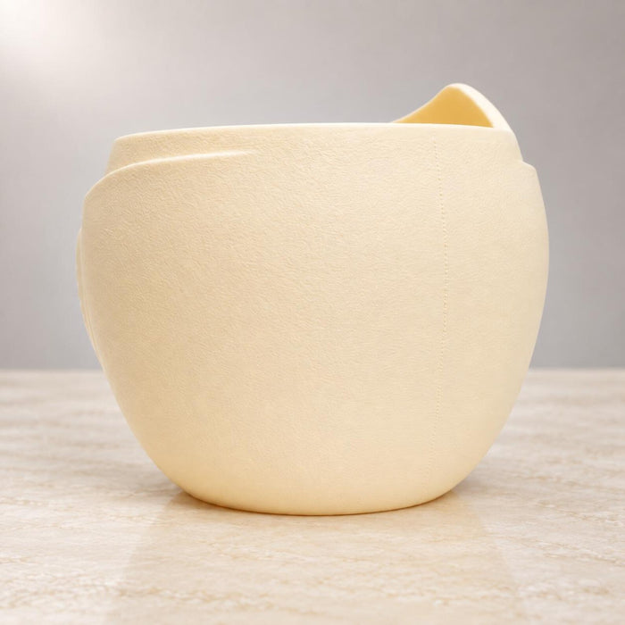 Back view of Aurelia cream white planter showing its rounded form and textured surface