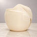 Rear side view of Aurelia cream white planter with sculpted leaf and gold detail