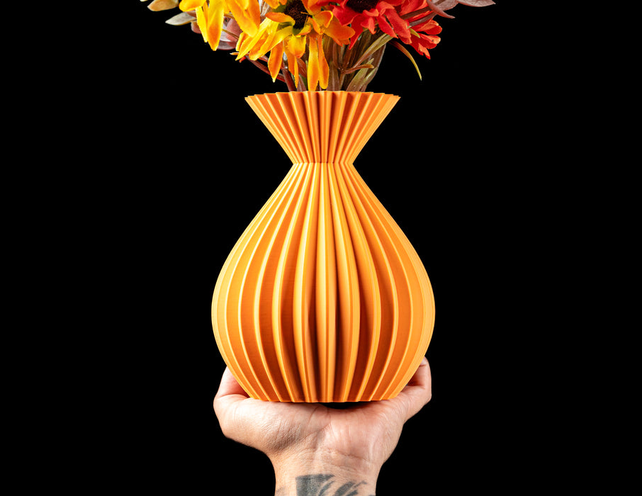 Auri flared-neck ribbed vase with flowers, front view