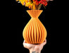 Auri flared-neck ribbed vase with flowers, front view