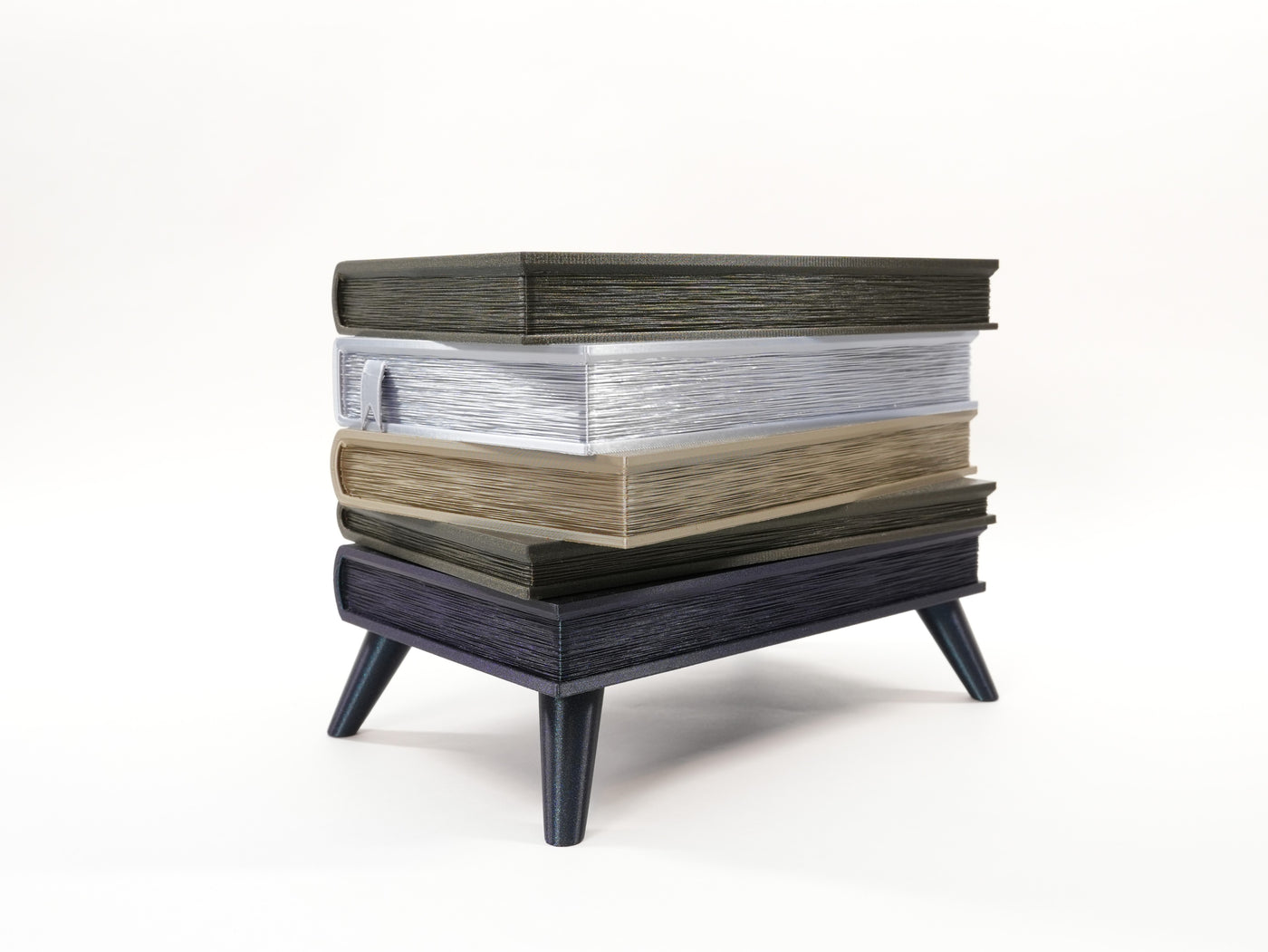 Book planter with legs showing the Orven 5 five-book stack design