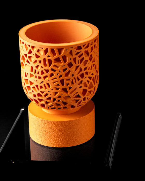 Cella lattice planter angled view showing smooth inner vessel