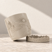 Cream Desert Sunrise planter tipped beside its separate cactus-patterned tray.