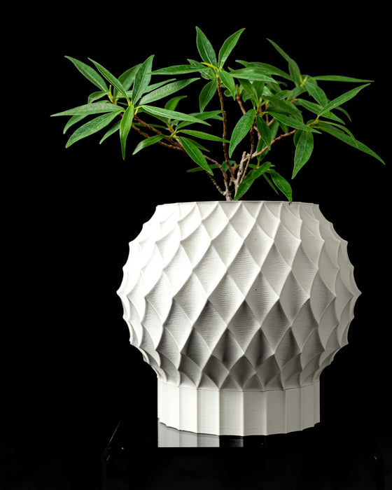 Diamond rounded faceted planter with plant, front product view