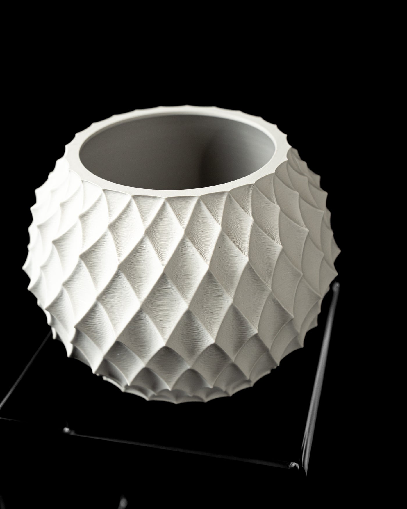Diamond planter angled top view showing round opening