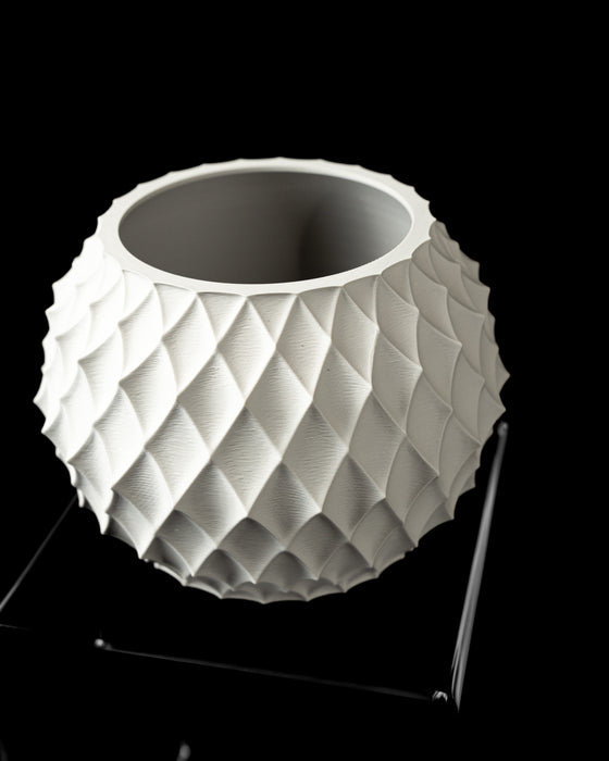 Diamond planter angled top view showing round opening