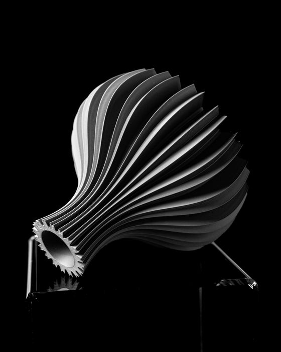 Dove fluted vase angled view showing curved ribs and narrow opening
