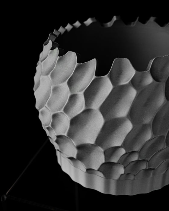 Close-up of Dune planter eroded faceted surface texture