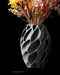Exo organic vase front view with flowers and deep cellular texture
