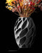 Exo organic vase front view with flowers and deep cellular texture