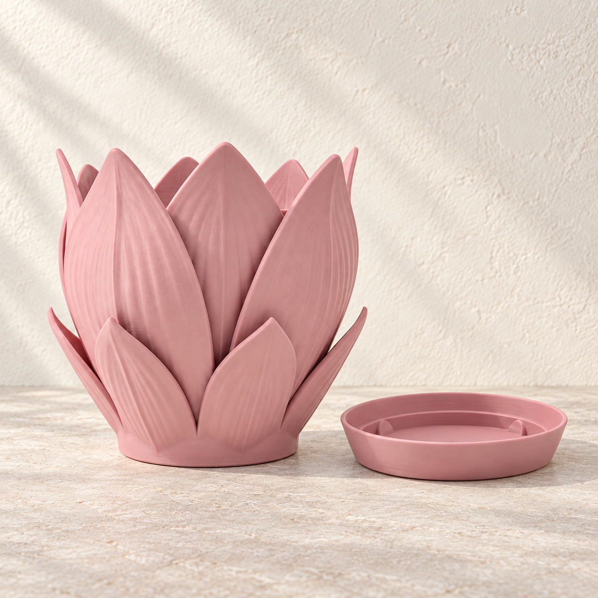 Florenn decorative sculptural planter featuring layered petal form around the planting opening
