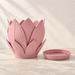 Florenn decorative sculptural planter featuring layered petal form around the planting opening