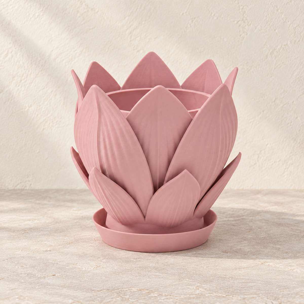 Florenn sculptural planter styled to show layered petal form around the planting opening