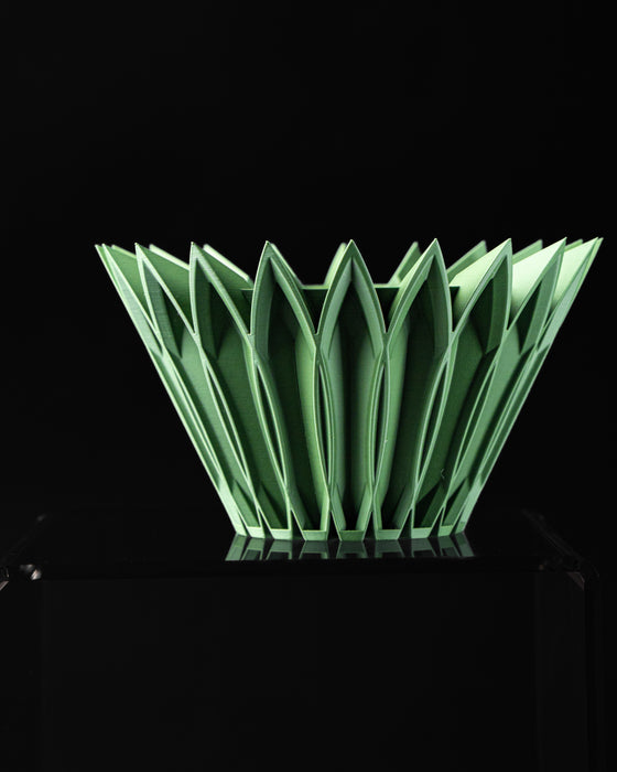 Front view of Florix sculptural indoor planter with pointed petal fins
