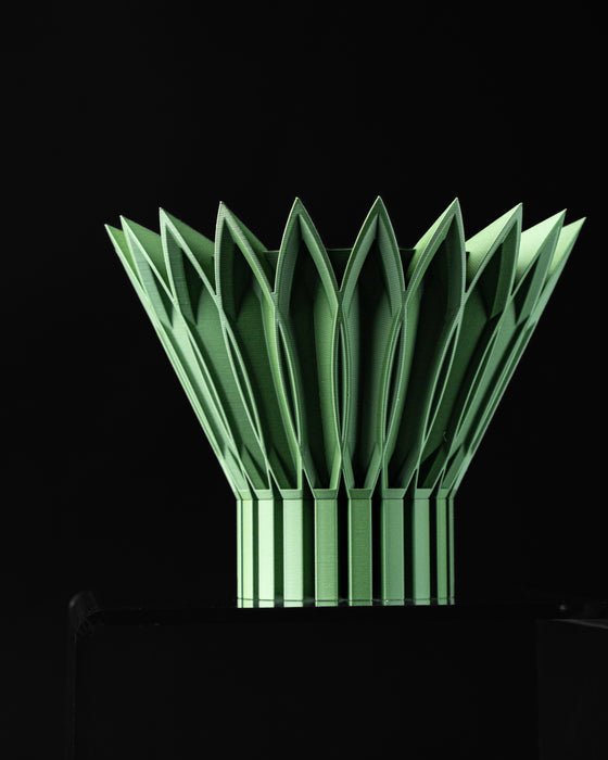 Side view of Florix decorative planter with flared botanical silhouette