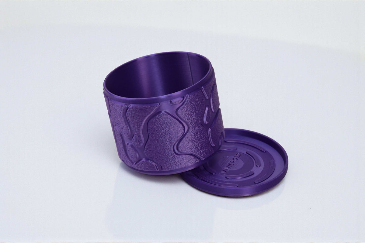 Flow continuous wave-like ridges with a smooth planting opening indoor planter, side view