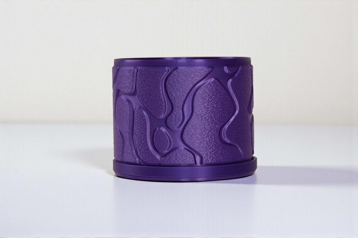 Flow continuous wave-like ridges with a smooth planting opening indoor planter, front view