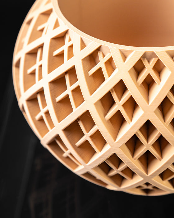 Close-up of Halo planter crossed open lattice shell