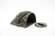 Sculptural face wall planter shown from the back with the separate wall mounting plate