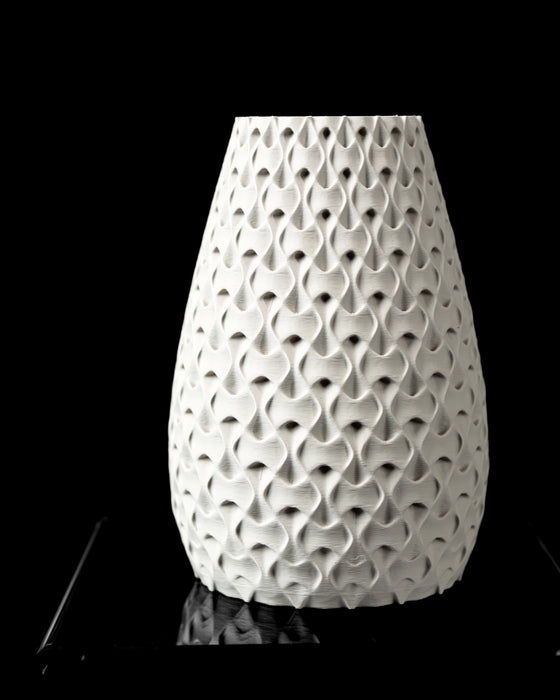 Inter open lattice textured vase for flowers, front view