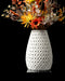 Inter openwork vase styled with dried flowers