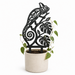 Kameo chameleon plant trellis in a cream planter supporting a flowering climbing vine