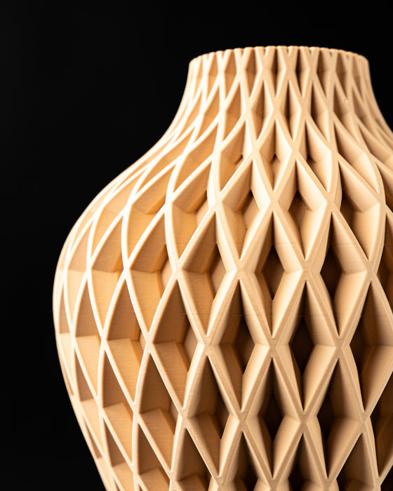 Side view of Ketra flower vase with rounded body and diamond texture