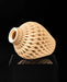 Detail view of Ketra sculptural vase and raised rib network