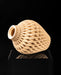 Detail view of Ketra sculptural vase and raised rib network