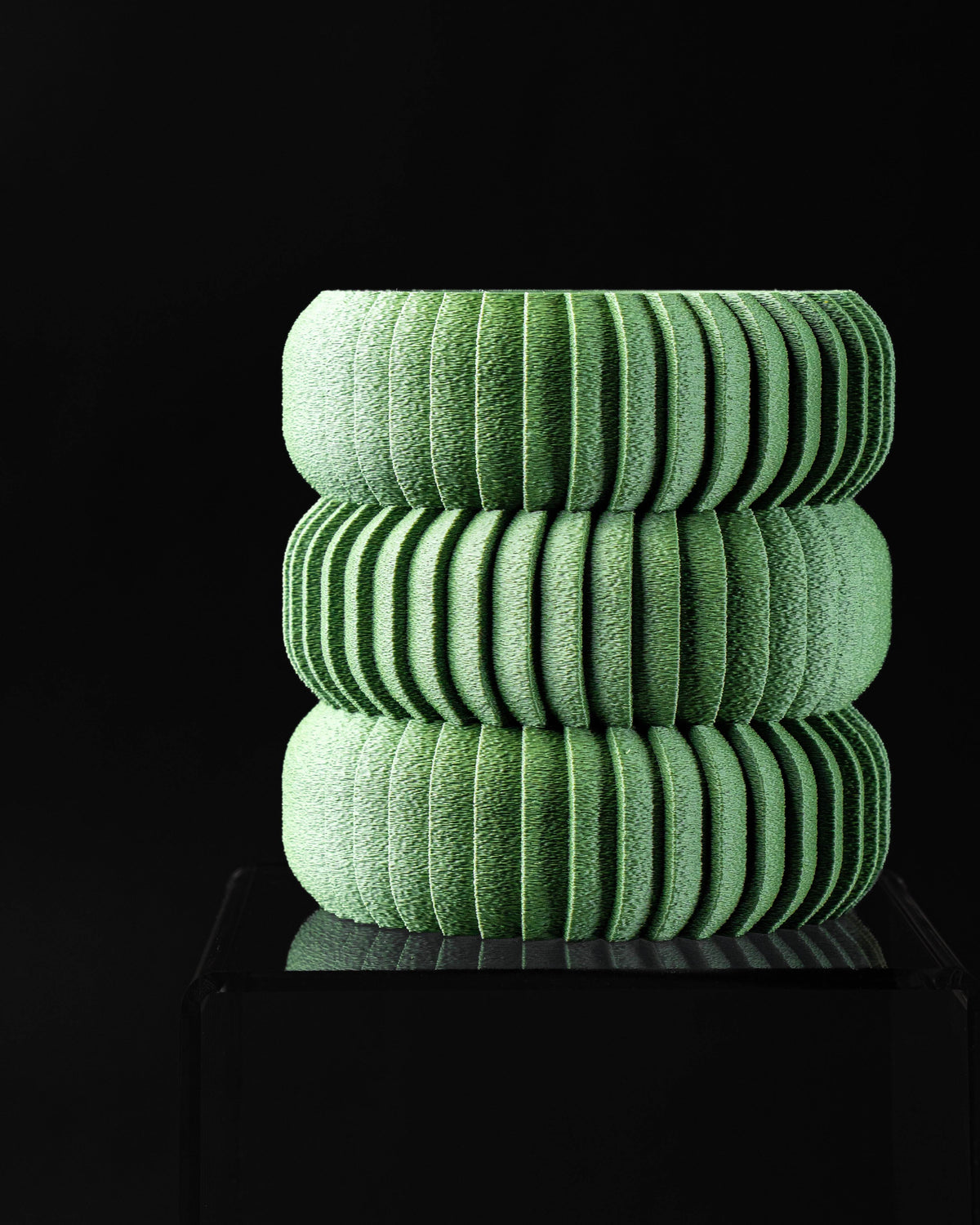 Koro sculptural ribbed planters stacked for styling