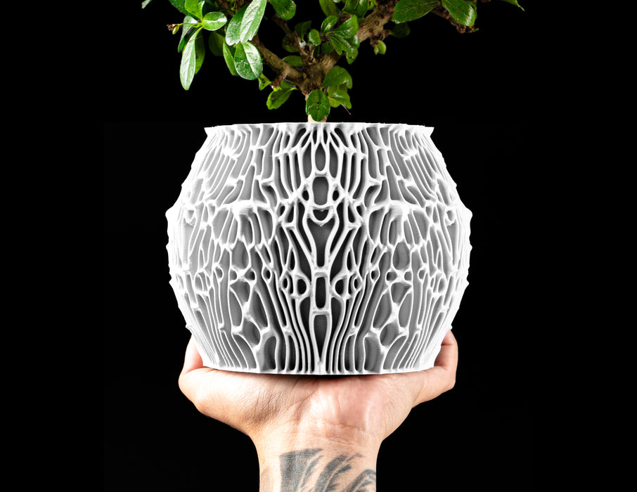 Nexis organic cellular indoor planter with sculptural raised network texture