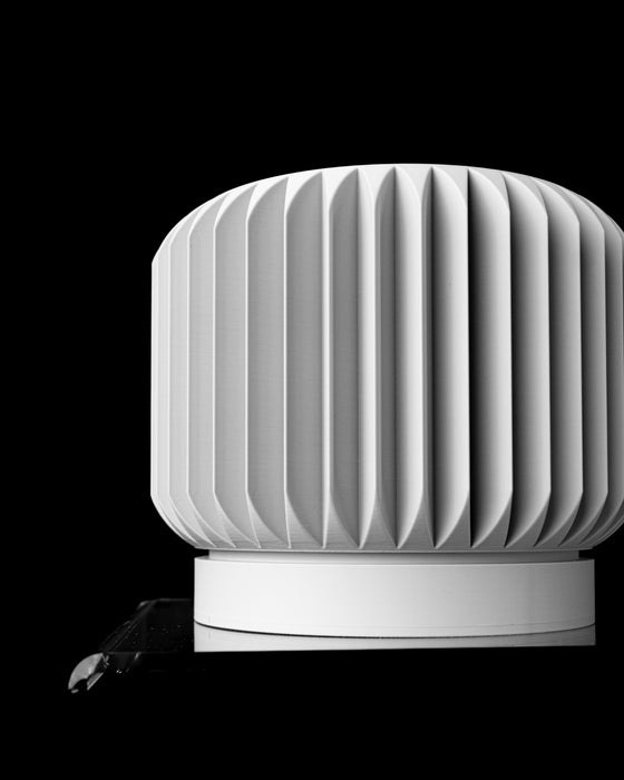 Nila ribbed pedestal planter for indoor plants, front view