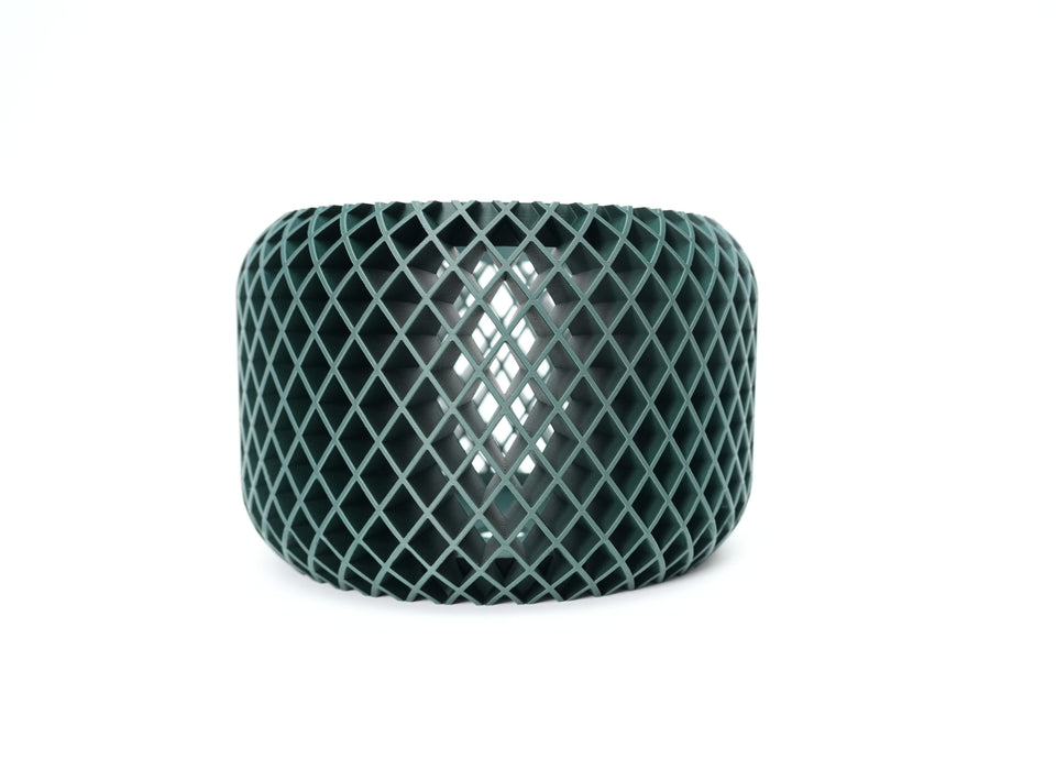 Ravik orchid pot close-up with diamond lattice texture for orchid roots and air circulation
