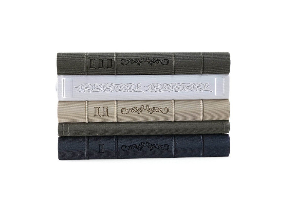 Orven 7 straight stacked book planter with ornate embossed spines in five colors