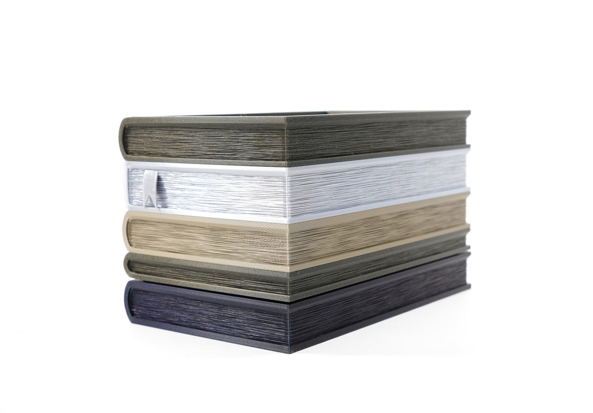 Page-edge view of Orven 7 aligned book planter with layered book page texture