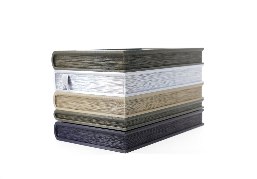 Page-edge view of Orven 7 aligned book planter with layered book page texture