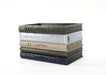 Side view of Orven 7 book stack planter showing page texture and ornate book spines