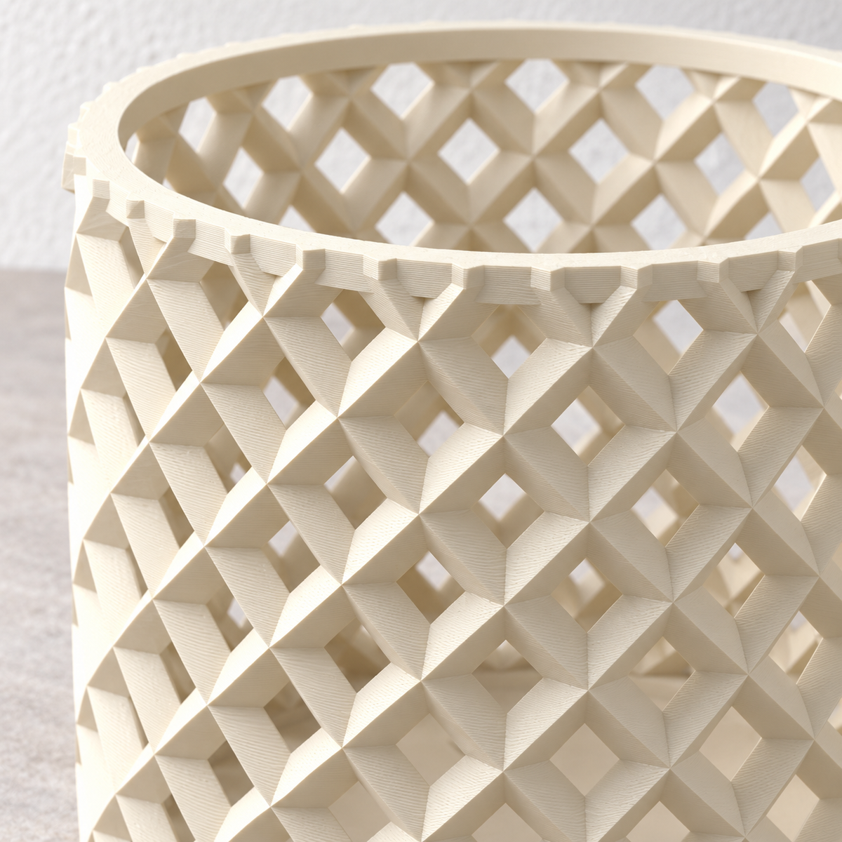 Close-up of Orvia's diagonal lattice bands, diamond ventilation openings, and visible print texture.