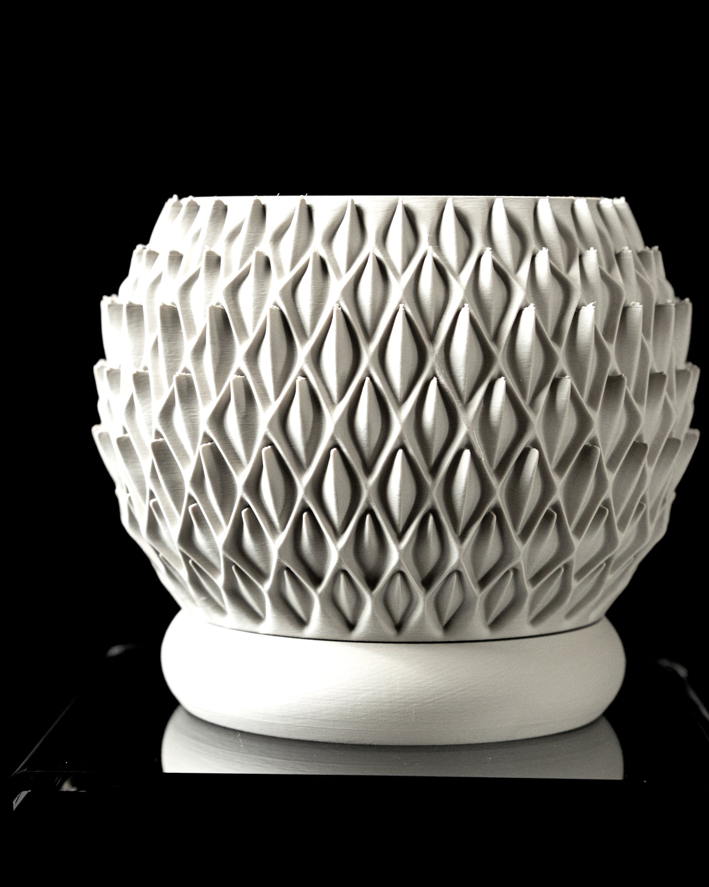 Petal textured round indoor planter pot, front view