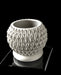 Petal round planter angled view showing opening and repeating diamond-petal texture